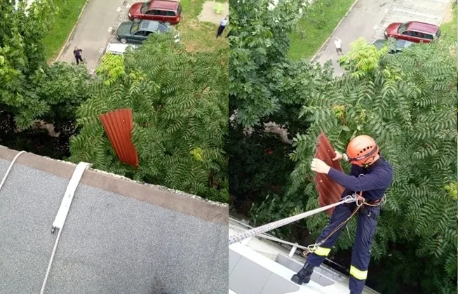 O bucată de acoperiș de pe un bloc din municipiu, smulsă de vânt