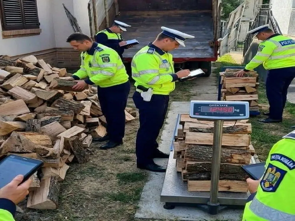 Polițiștii din Satu Mare, obligați să cântărească zilnic lemnele de foc pe care le folosesc pentru a se încălzi
