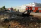 Remorca unui TIR, cuprinsă de un incendiu de vegetație